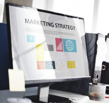 Pic - computer with marketing plan on it